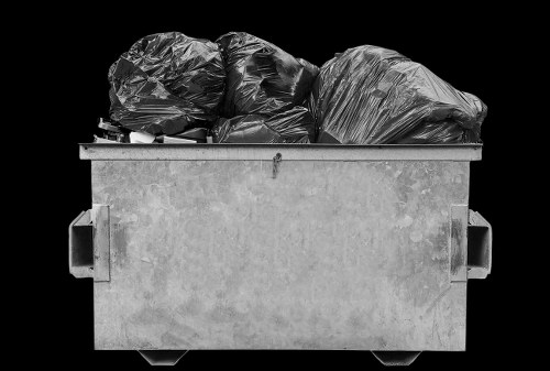 Supervisor reviewing safety checklist for waste collection operations